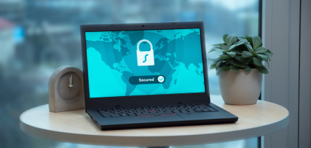 Image of a laptop with a lock on the screen on a table