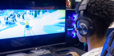 Person playing sports games on a a computer