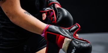 A person wearing boxing gloves
