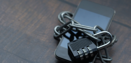 A phone and a lock depicting two factor authorization