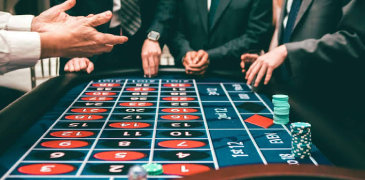 People at a casino table game