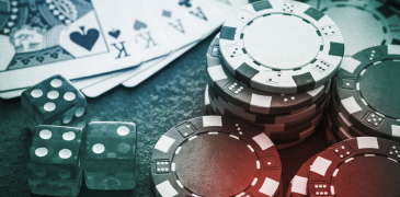Overhead shot of playing cards and poker chips with overlay